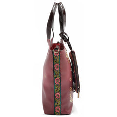 THE QUEEN TOTE WITH WRISTLET